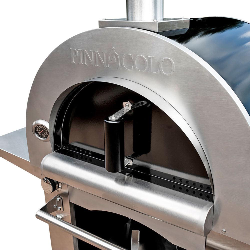 http://bellapizzaovens.com/cdn/shop/products/Fire-One-Up-Pinnacolo-Ibrido-Pizza-Oven-upclose-door_1200x1200.jpg?v=1652794507